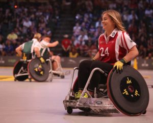 Young people in wheelchairs playing sports