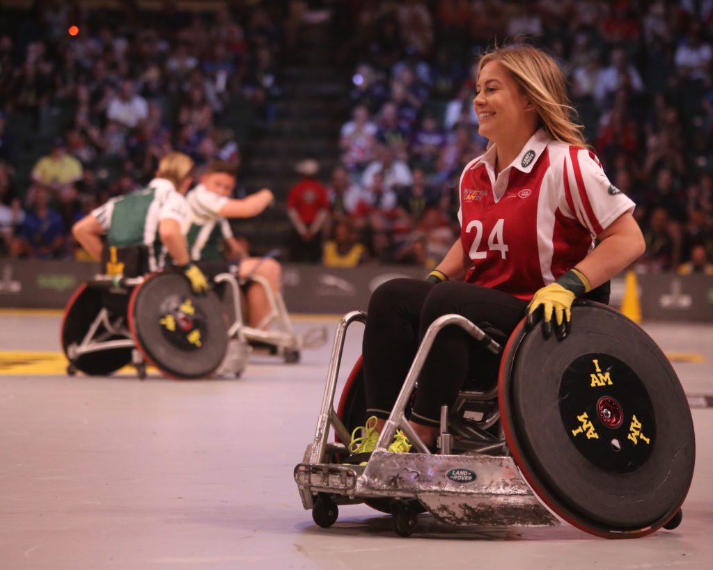 Young people in wheelchairs playing sports