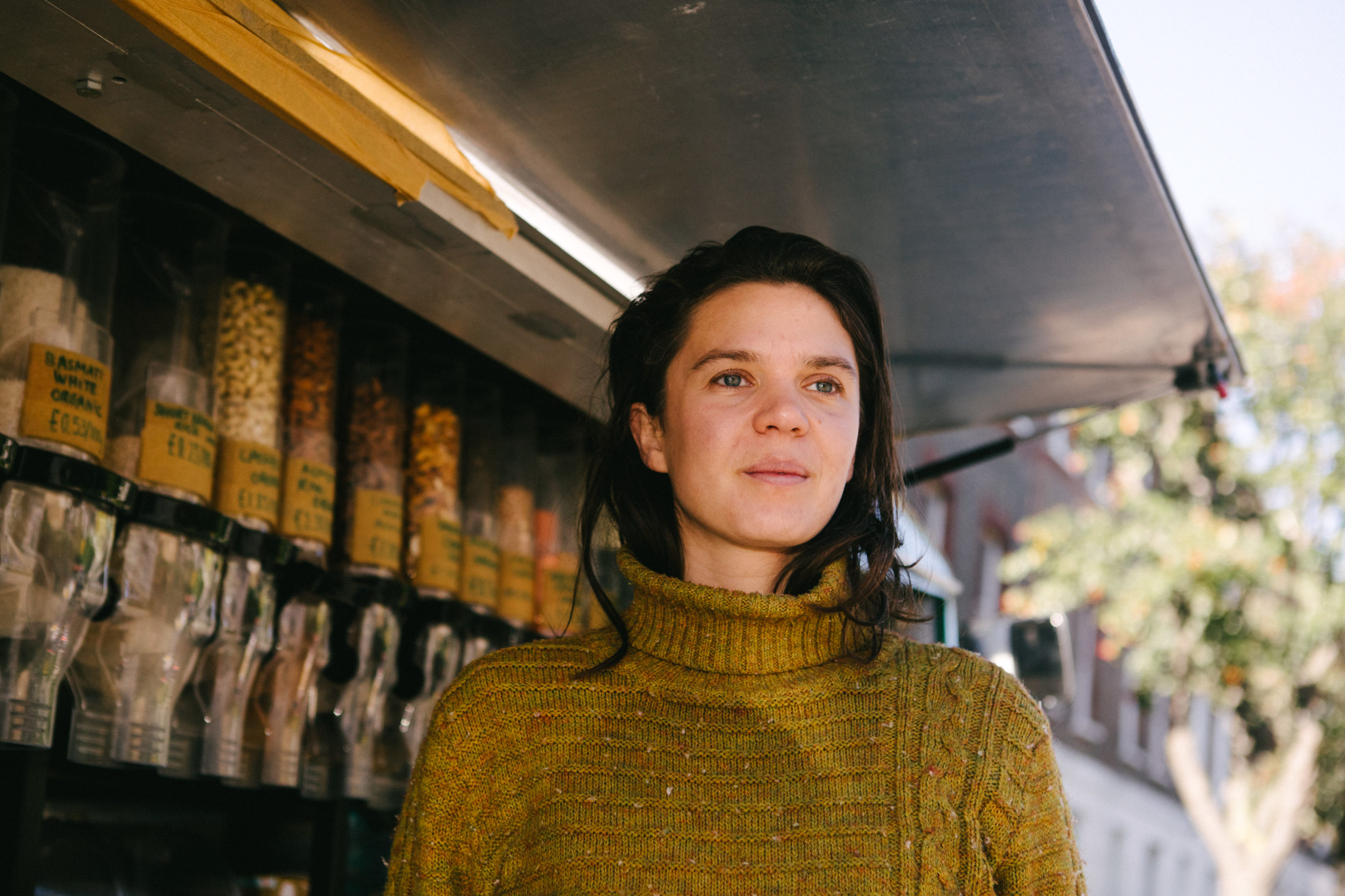 Woman standing in front of food van