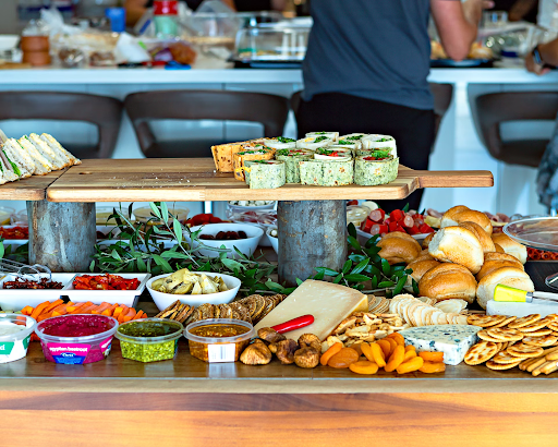 Prepared food laid out on a counter in a cafe